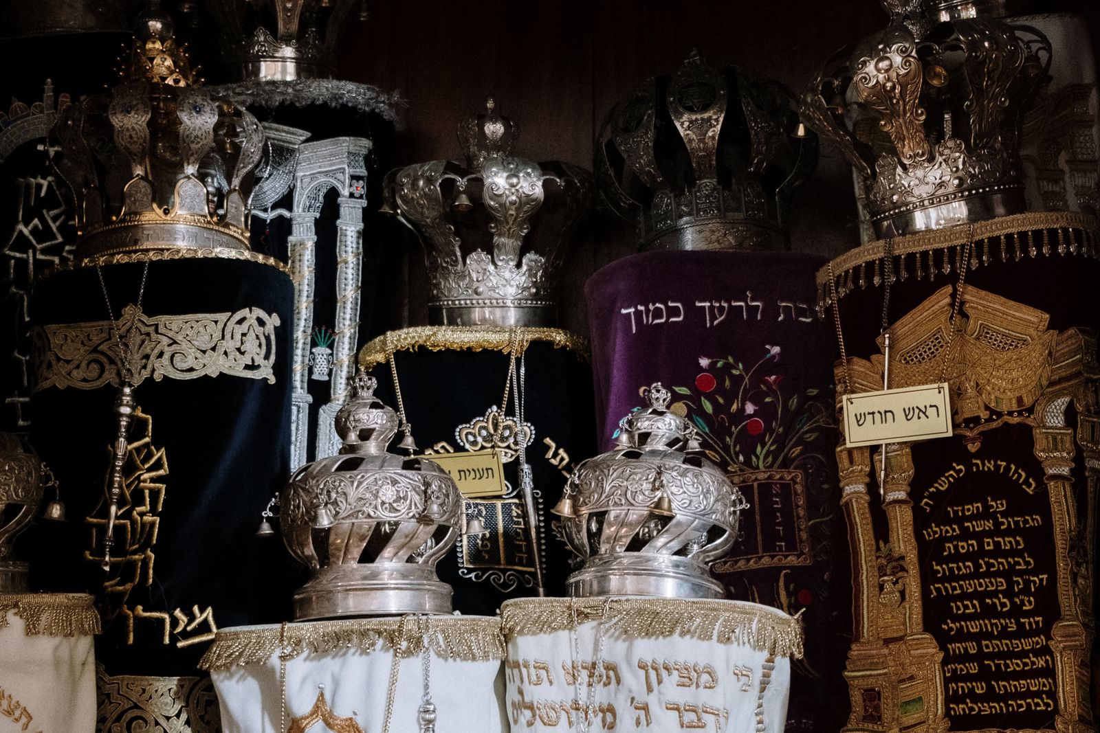 Ornately dressed Torah scrolls